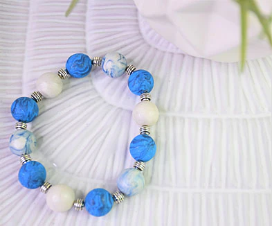Sculpey III® Blue Glitter Marbled Beaded Bracelet
